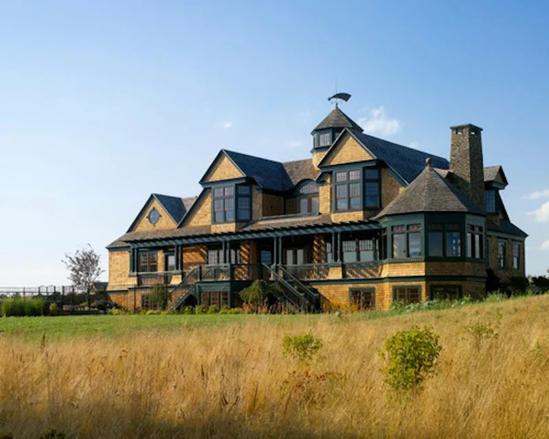 yellow house with lawn
